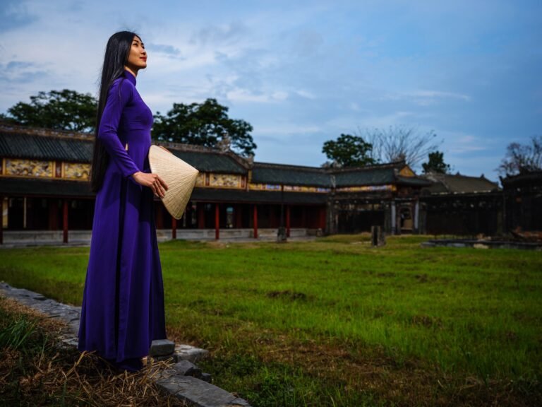 Woman in Purple Ao Dai at Hue’s Imperial City